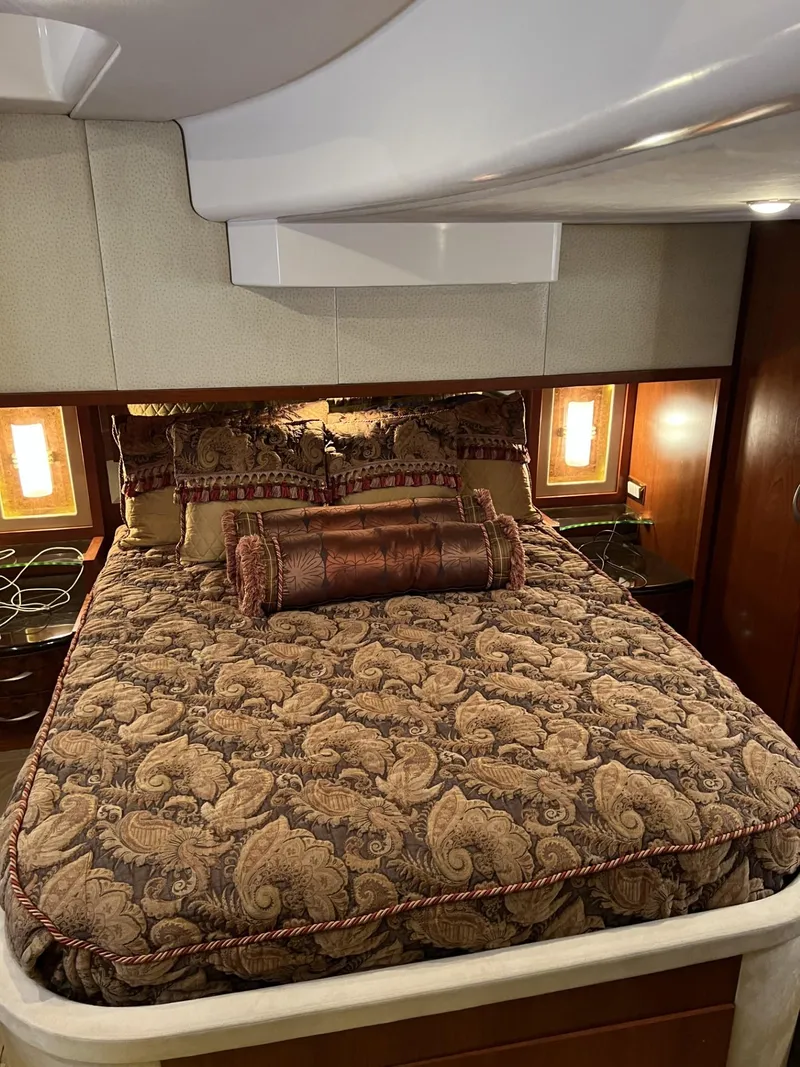 Slide: The Image of Luxurious bedroom interior in a 2008 Ovation 52 yacht with elegant bedding. - 37