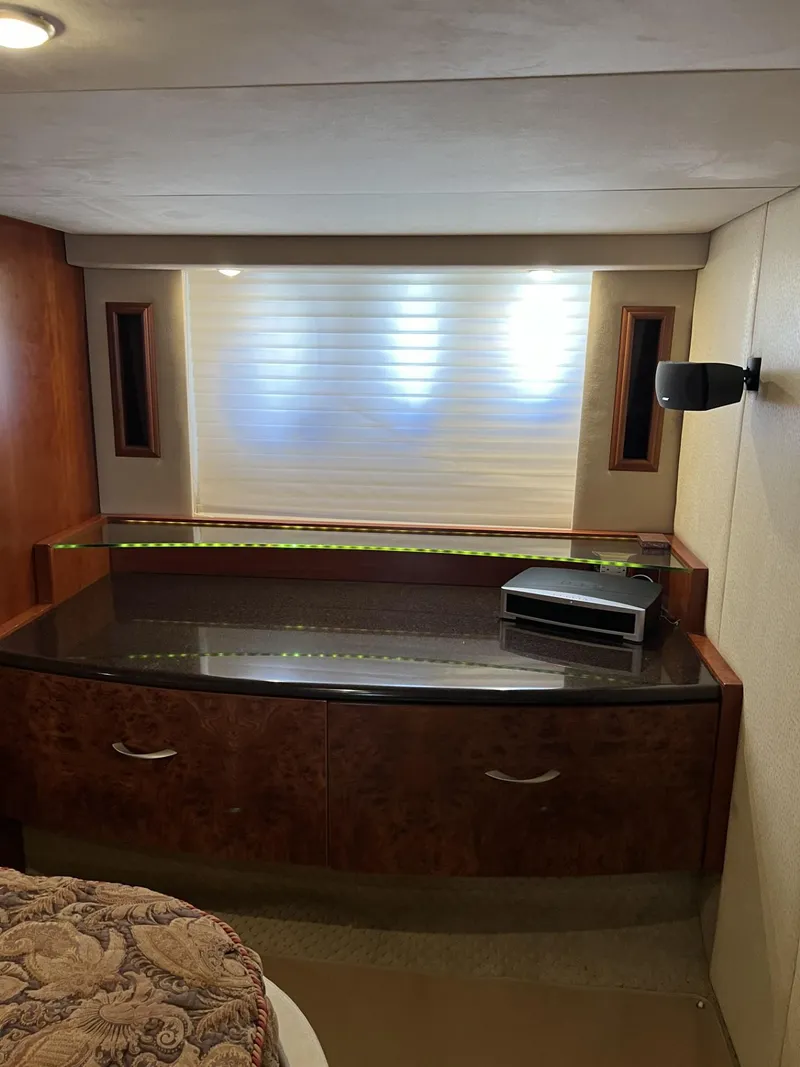Slide: The Image of Luxurious interior of a 2008 Ovation 52 yacht with modern furnishings and ambient lighting. - 38