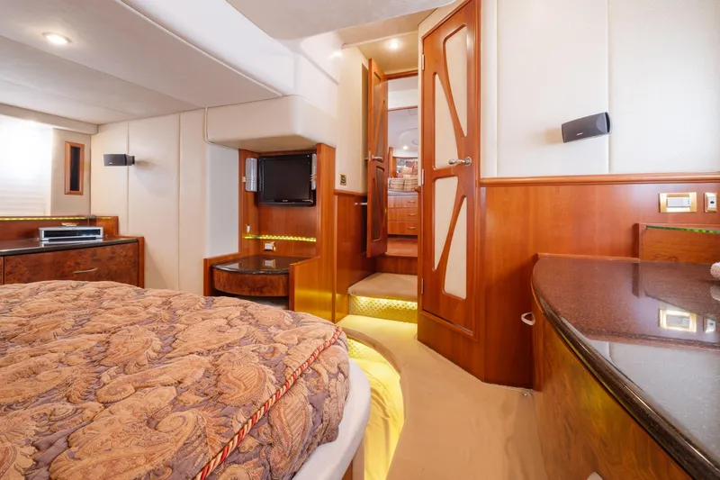 Slide: The Image of Luxurious interior of a 2008 Ovation 52 yacht with elegant wood finishes and modern amenities. - 55