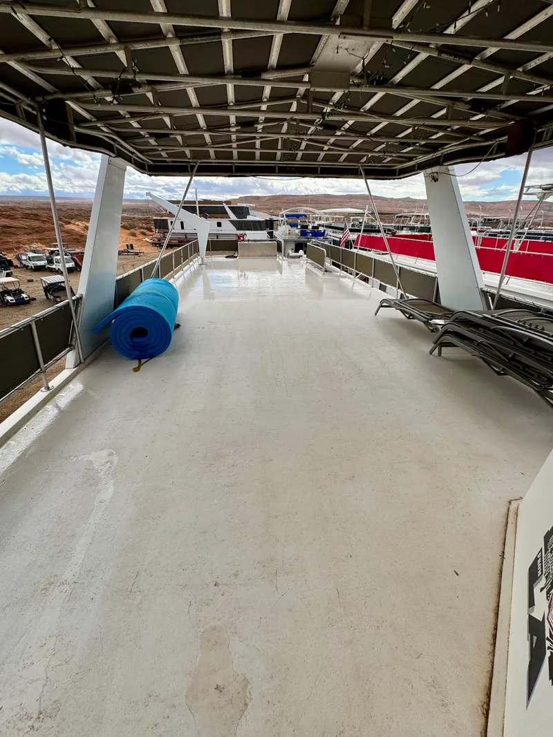 Slide: The Image of Upper deck of a 2000 Fantasy Escape From LA houseboat, featuring open space and scenic views. - 23