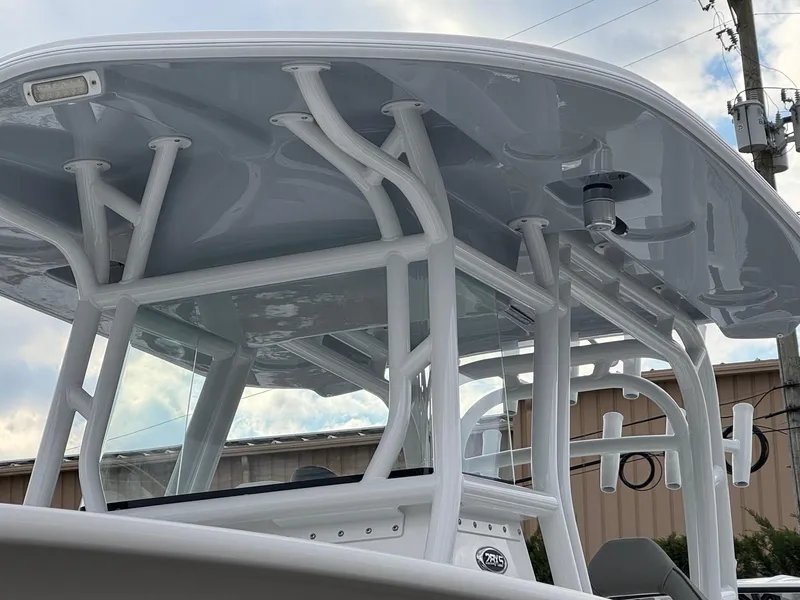 Slide: The Image of 2025 Cape Horn 28 XS boat with sturdy T-top and rod holders. - 3