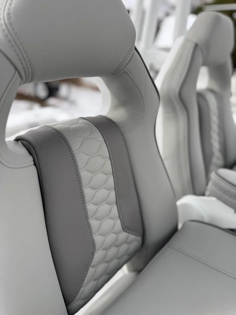 Slide: The Image of 2025 Cape Horn 28 XS boat seats with elegant gray and white upholstery design. - 36