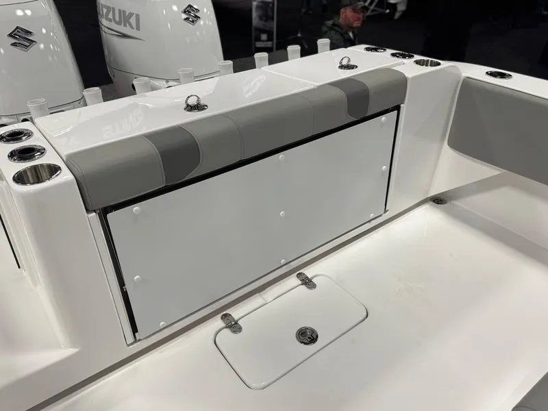 Slide: The Image of 2025 Cape Horn 28 XS boat interior with Suzuki engines, featuring seating and storage compartments. - 44