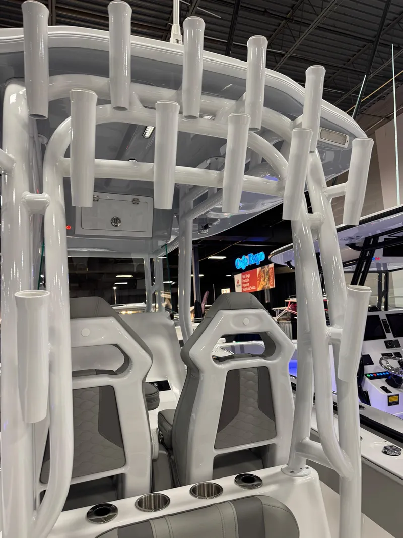 Slide: The Image of 2025 Cape Horn 28 XS boat interior with rod holders and seating. - 46