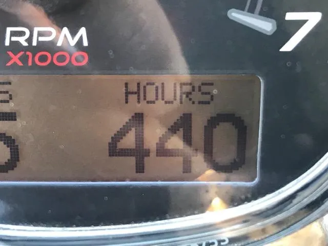Slide: The Image of Hour meter showing 440 hours on 2015 Sea Ray 220 Sundeck Outboard. - 14