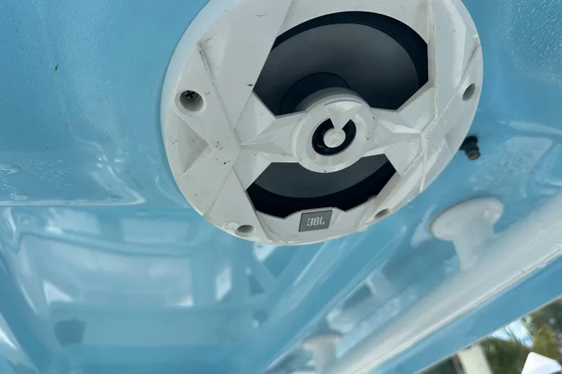 Slide: The Image of JBL speaker installed on 2018 Sea Hunt 25 Gamefish boat, blue interior. - 18