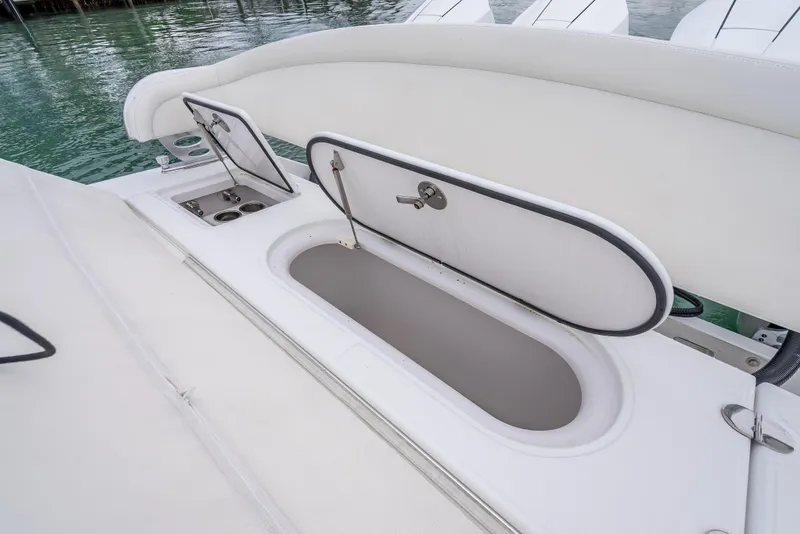 Slide: The Image of 2017 Bahama Center Console boat with open storage compartments on deck. - 29