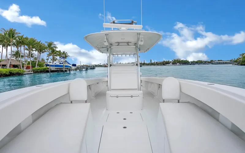 Slide: The Image of 2017 Bahama Center Console boat on calm water with clear blue sky. - 8