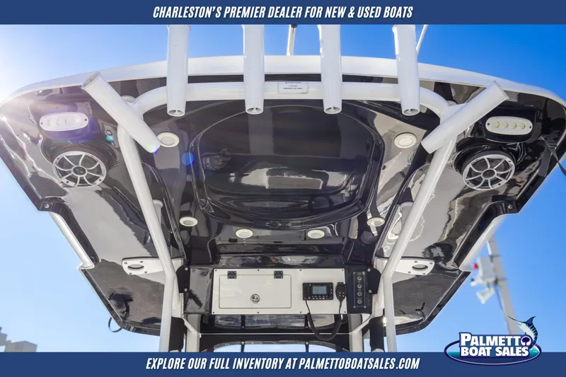 Slide: The Image of 2022 Sea Pro 259 Center Console boat with advanced electronics and speakers, showcased by Palmetto Boat Sales. - 12