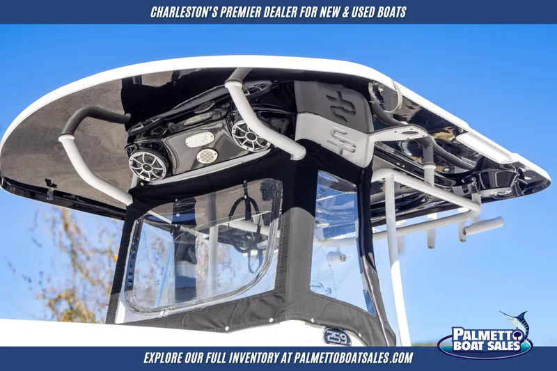 Slide: The Image of 2022 Sea Pro 259 Center Console boat with advanced audio system and sleek design. - 2