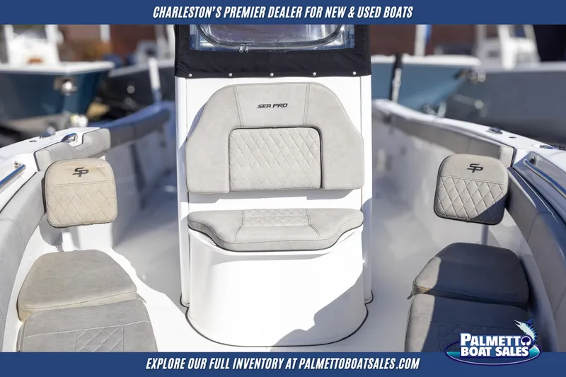 Slide: The Image of 2022 Sea Pro 259 Center Console boat interior with cushioned seating. - 22