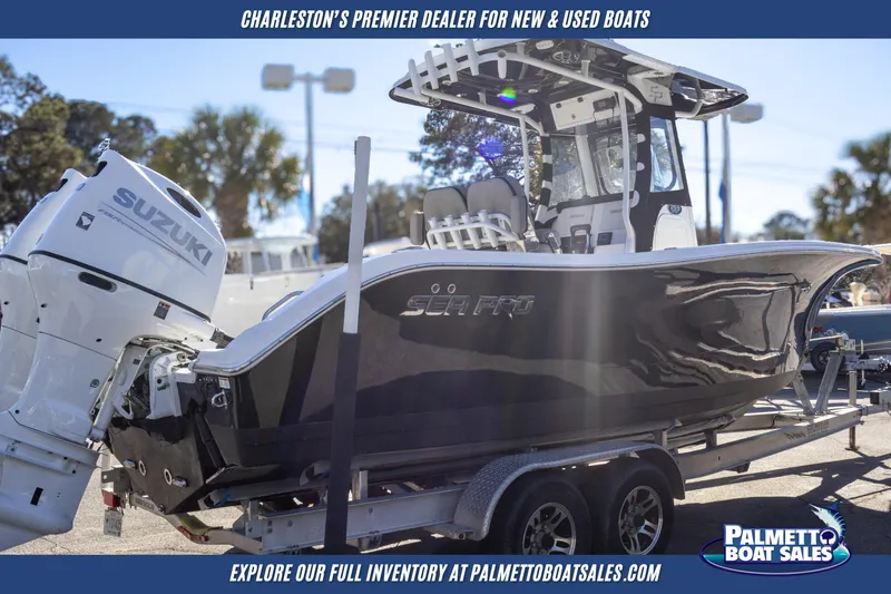 Slide: The Image of 2022 Sea Pro 259 Center Console boat with Suzuki engine on trailer. - 5