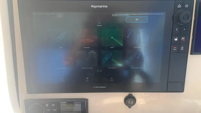 Slide: The Image of Raymarine navigation display on 2019 Boston Whaler 320 Vantage boat dashboard. - 20