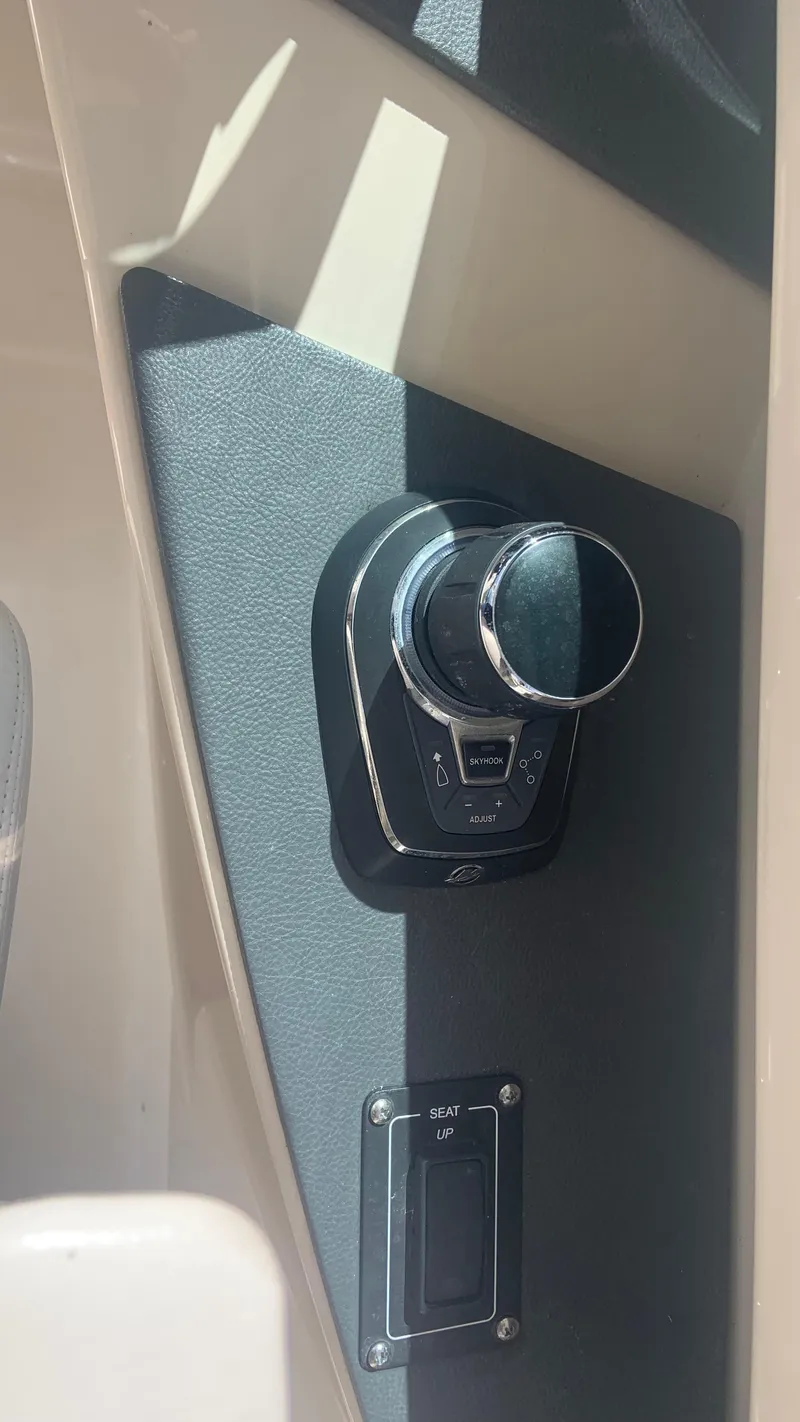 Slide: The Image of 2019 Boston Whaler 320 Vantage control panel with joystick. - 5