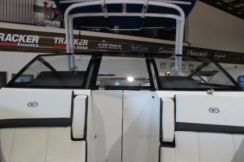 Slide: The Image of 2025 Cobalt R6 boat interior with white seating and black accents. - 34