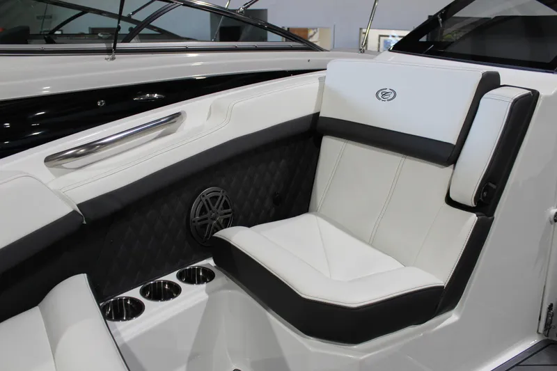 Slide: The Image of Luxurious seating in 2025 Cobalt R6 boat with cup holders and speaker. - 36