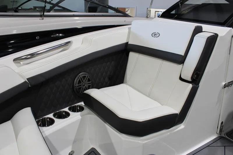 Slide: The Image of 2025 Cobalt R6 boat interior with luxurious white seating and cup holders. - 37