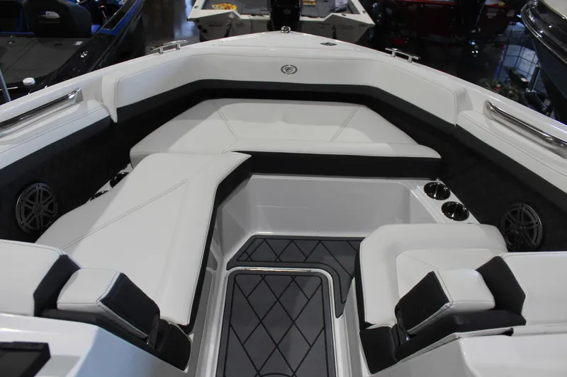 Slide: The Image of 2025 Cobalt R6 boat interior with sleek white seating and modern design. - 41