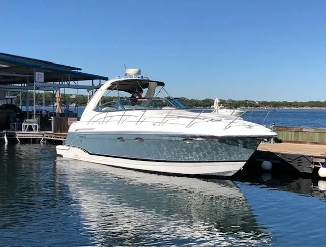 The Image of 2006 Formula 34 PC yacht docked on a sunny day at a marina. - 1