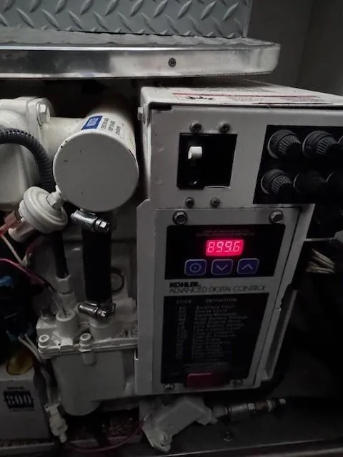 Slide: The Image of Control panel of a 2006 Formula 34 PC boat engine room. - 7