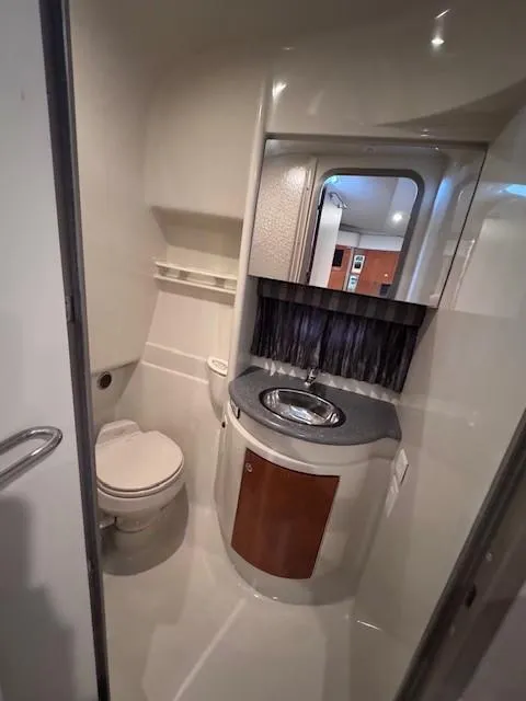 Slide: The Image of 2006 Formula 34 PC yacht bathroom with modern sink and toilet. - 8