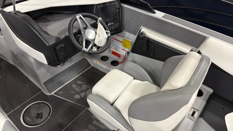 Slide: The Image of Interior of 2021 ATX Surf Boats 20 Type-S with steering console. - 15