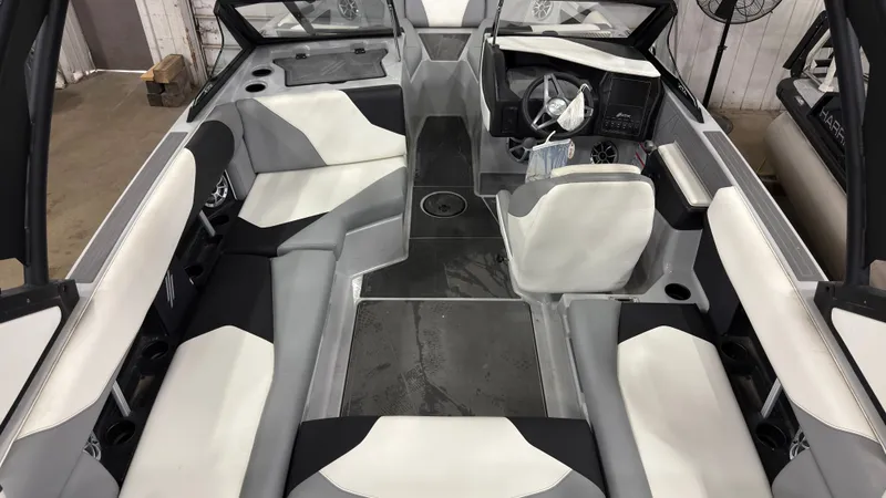 Slide: The Image of Interior of a 2021 ATX Surf Boats 20 Type-S with gray and white seating. - 9