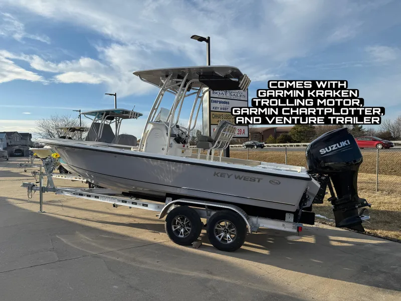 The Image of 2025 Key West 230 Bay Reef boat with Suzuki motor, Garmin Kraken trolling motor, and Venture trailer. - 0