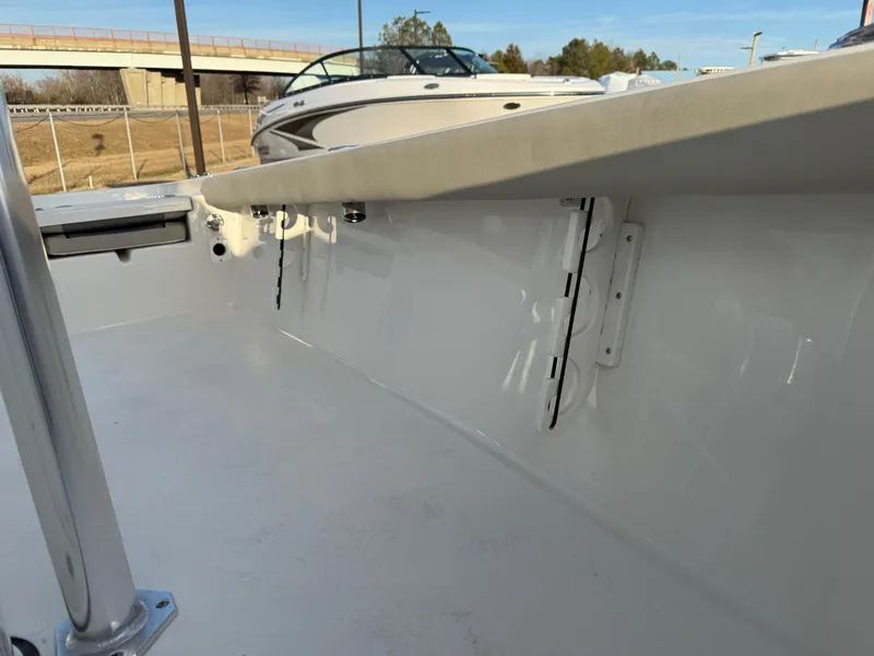 Slide: The Image of 2025 Key West 230 Bay Reef boat interior, showcasing sleek white design and spacious layout. - 20