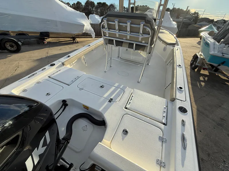 Slide: The Image of 2025 Key West 230 Bay Reef boat with spacious deck and seating. - 7