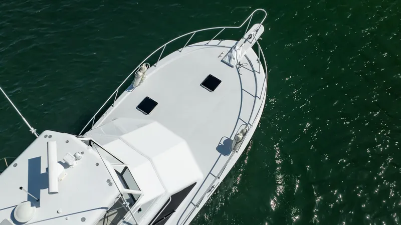Slide: The Image of Aerial view of 1991 Jersey 42 Convertible Sportfisherman on green water. - 16