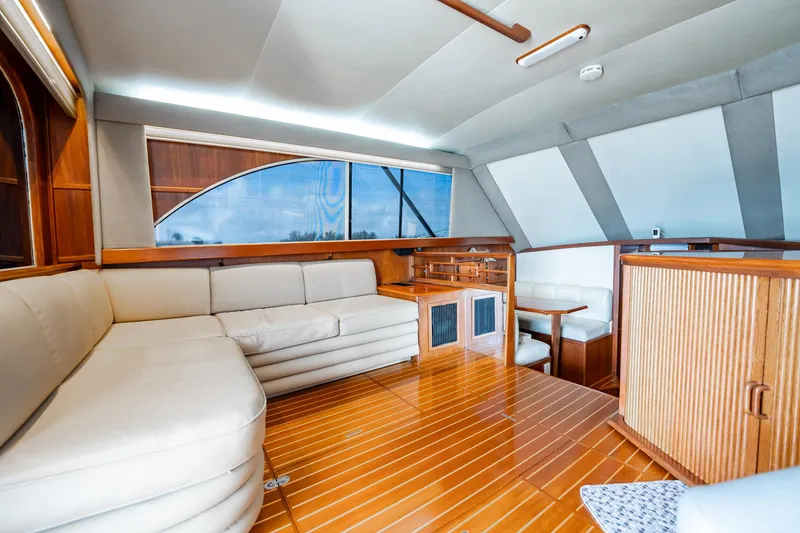Slide: The Image of Luxurious interior of 1991 Jersey 42 Convertible Sportfisherman with elegant wood finishes. - 26