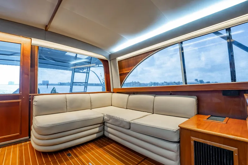 Slide: The Image of Interior of 1991 Jersey 42 Convertible Sportfisherman with beige seating and wooden accents. - 27