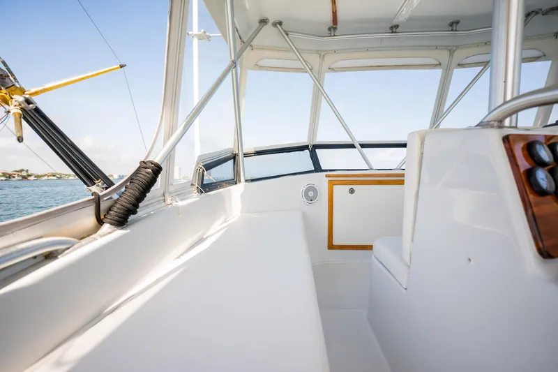 Slide: The Image of 1991 Jersey 42 Convertible Sportfisherman interior with ocean view and sleek design. - 30