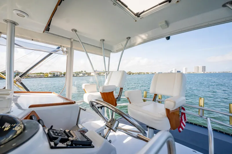 Slide: The Image of Interior view of 1991 Jersey 42 Convertible Sportfisherman yacht with ocean backdrop. - 34