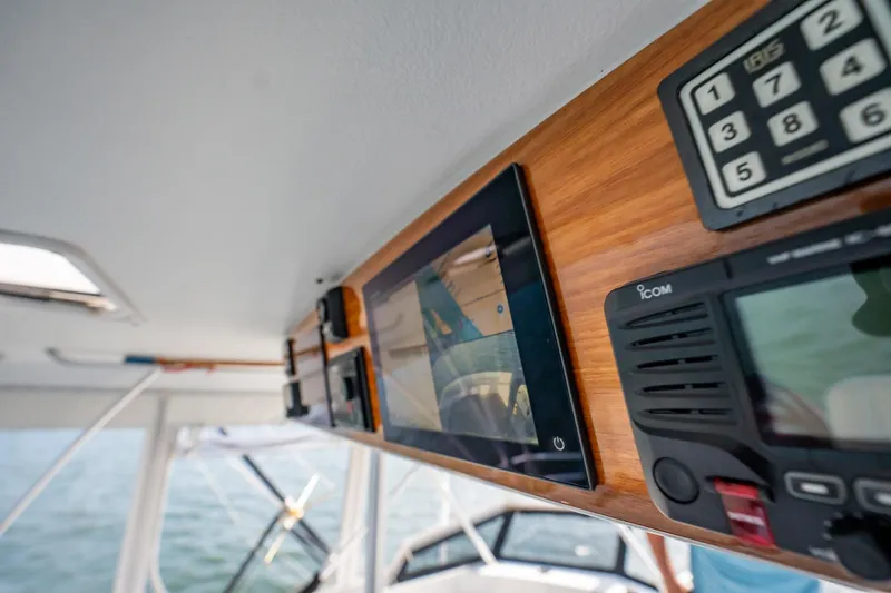 Slide: The Image of Interior view of 1991 Jersey 42 Convertible Sportfisherman with navigation equipment. - 39