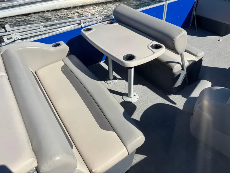 Slide: The Image of Interior of 2022 Princecraft Vectra 23 pontoon boat with seating and table. - 16