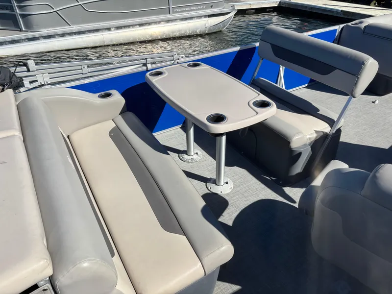 Slide: The Image of Interior of 2022 Princecraft Vectra 23 pontoon boat with seating and table. - 17