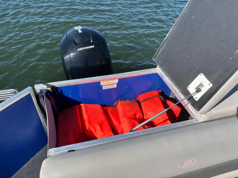 Slide: The Image of 2022 Princecraft Vectra 23 boat with life jackets and Mercury outboard motor. - 20