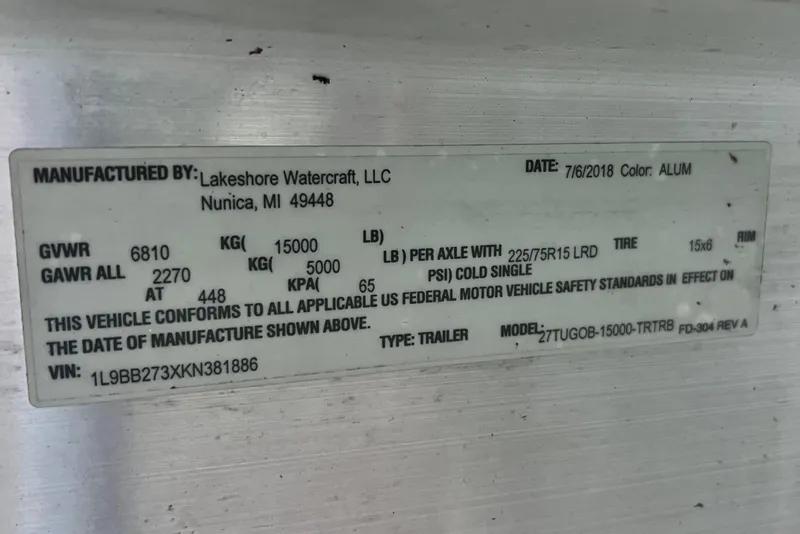 Slide: The Image of Label on a 2020 Ranger Tugs 27 trailer by Lakeshore Watercraft, LLC, detailing specifications. - 20