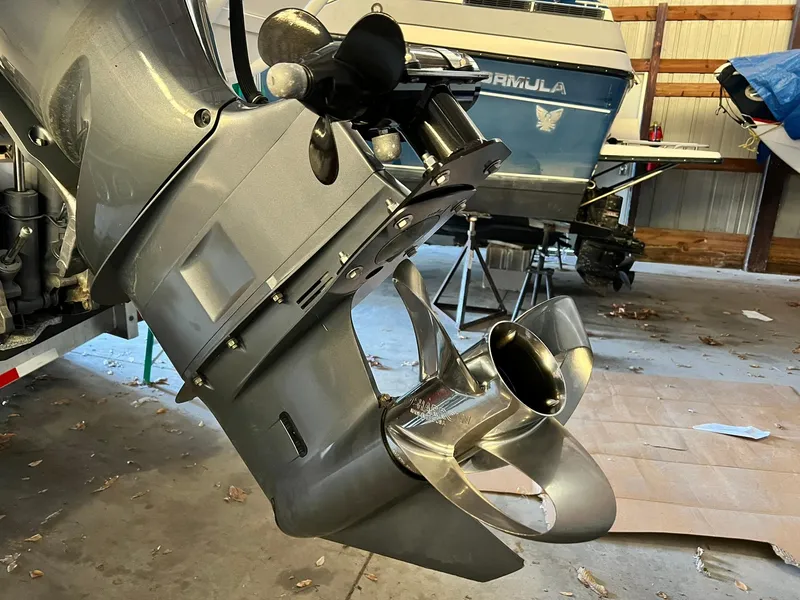 Slide: The Image of Close-up of a 2020 Ranger Tugs 27 boat propeller in a garage setting. - 22