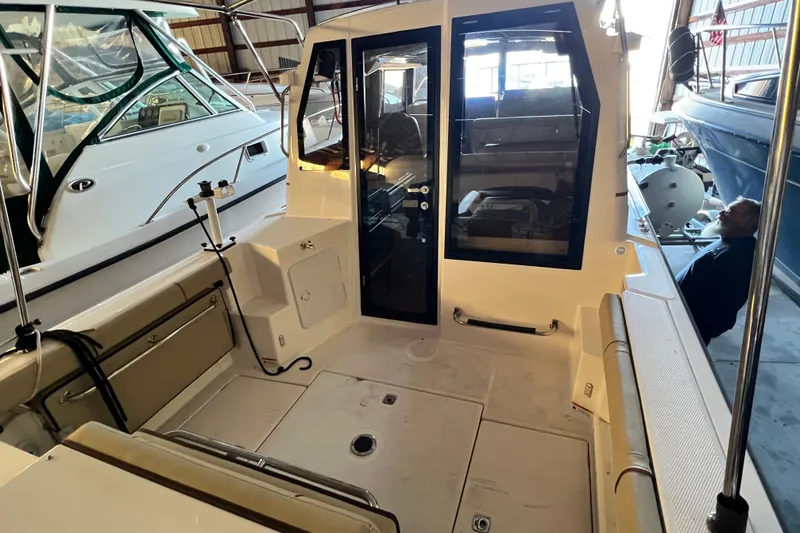 Slide: The Image of 2020 Ranger Tugs 27 boat interior in a storage facility. - 3