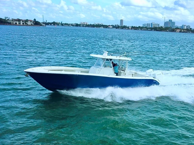 The Image of 2017 Yellowfin 39 Offshore boat cruising on blue ocean waters. - 1