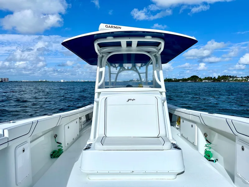 Slide: The Image of 2017 Yellowfin 39 Offshore boat on open water under blue sky. - 18