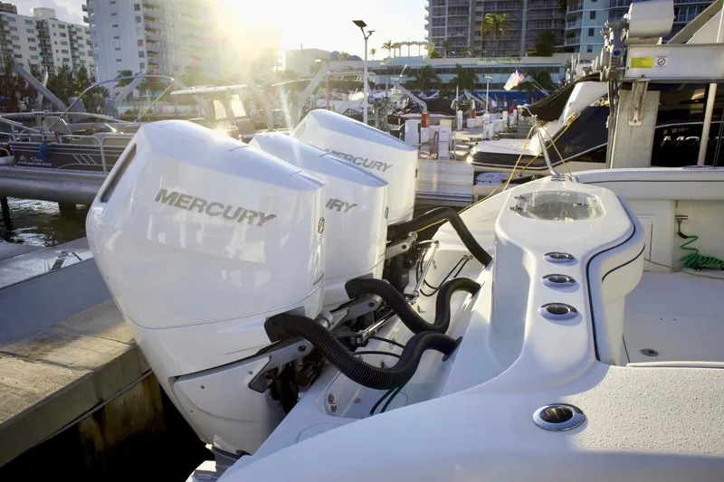 Slide: The Image of 2017 Yellowfin 39 Offshore boat with twin Mercury engines docked at marina. - 23