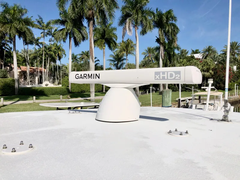 Slide: The Image of Garmin xHD2 radar on 2017 Yellowfin 39 Offshore boat, surrounded by palm trees. - 28