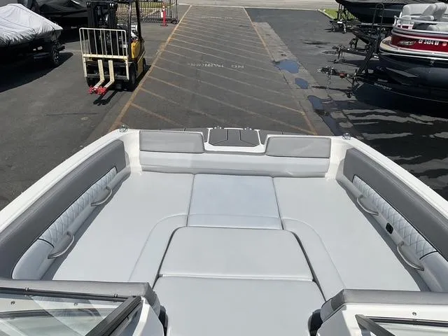 Slide: The Image of 2025 Bayliner D22 boat interior with spacious seating and modern design. - 12