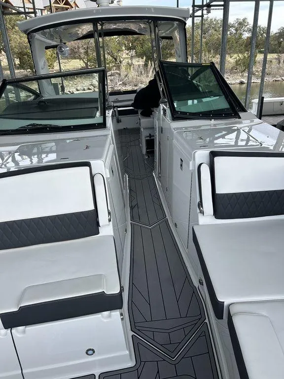 Slide: The Image of 2023 Monterey 378SS boat interior with sleek seating and modern design. - 27