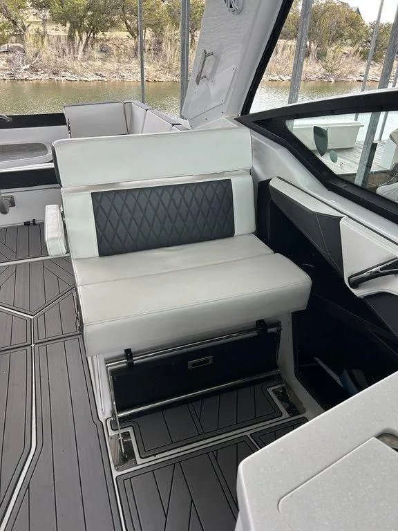 Slide: The Image of 2023 Monterey 378SS boat interior with modern seating and sleek design. - 30