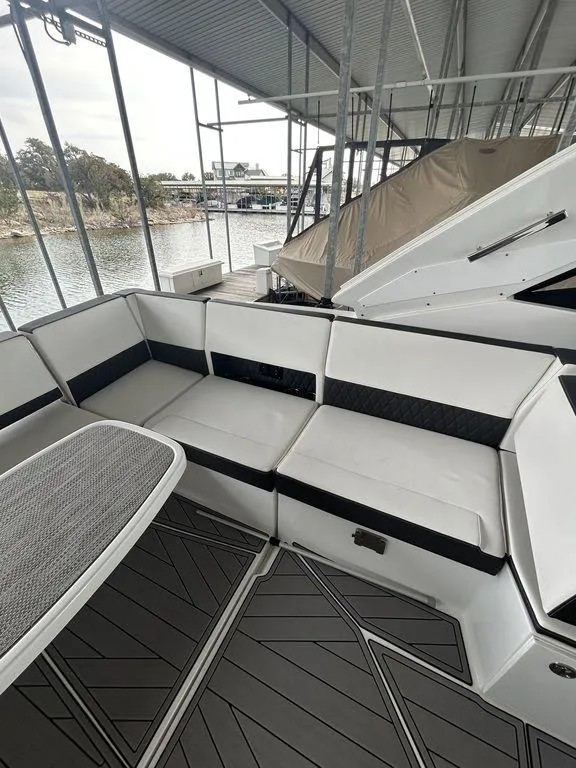 Slide: The Image of 2023 Monterey 378SS boat interior with white seating and modern design. - 44